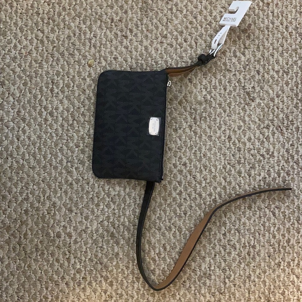 Michael Kors wallet on a belt